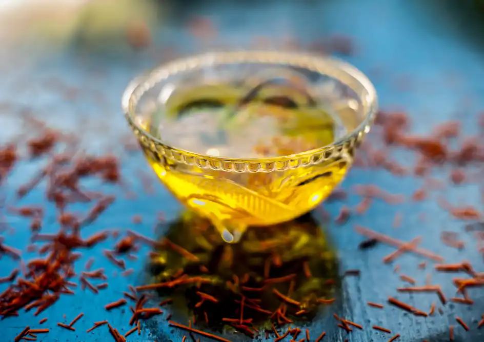 saffron syrup in a small glass bowl